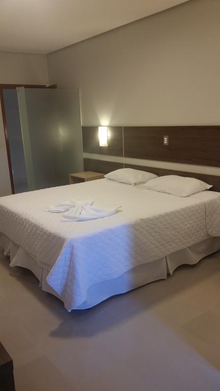 Kamur Plaza Hotel Гоянезия Номер фото